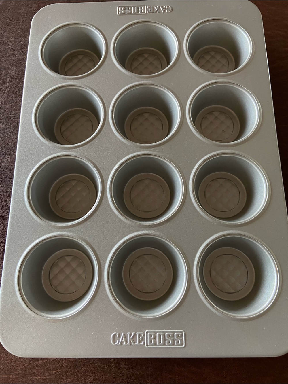 Cake Boss 12-Cup cupcake Pan in Silver - Nonstick Bakeware